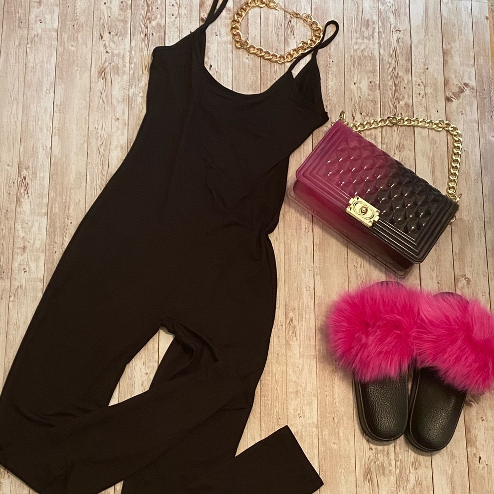New Black jumpsuit with sexy low cut back